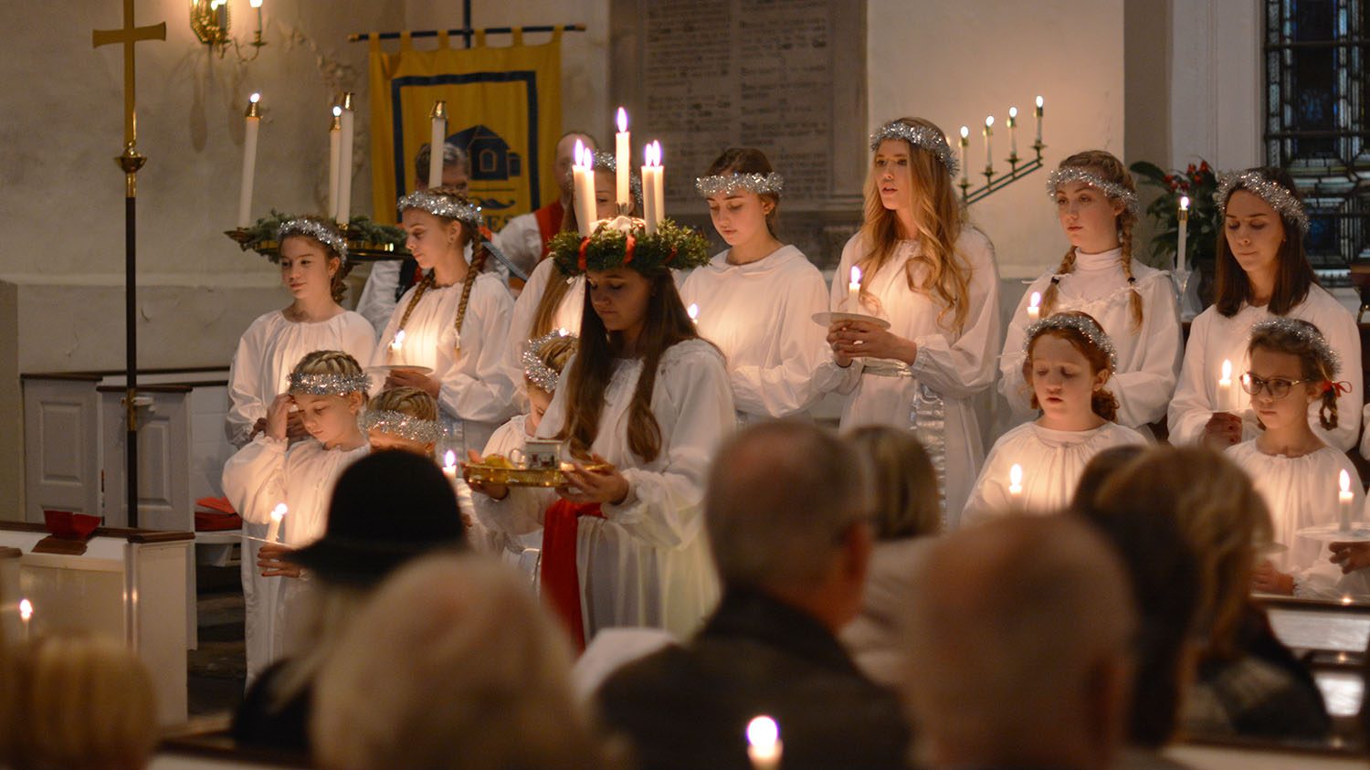 Singers during a Sankta Lucia Celebration at Old Swedes.